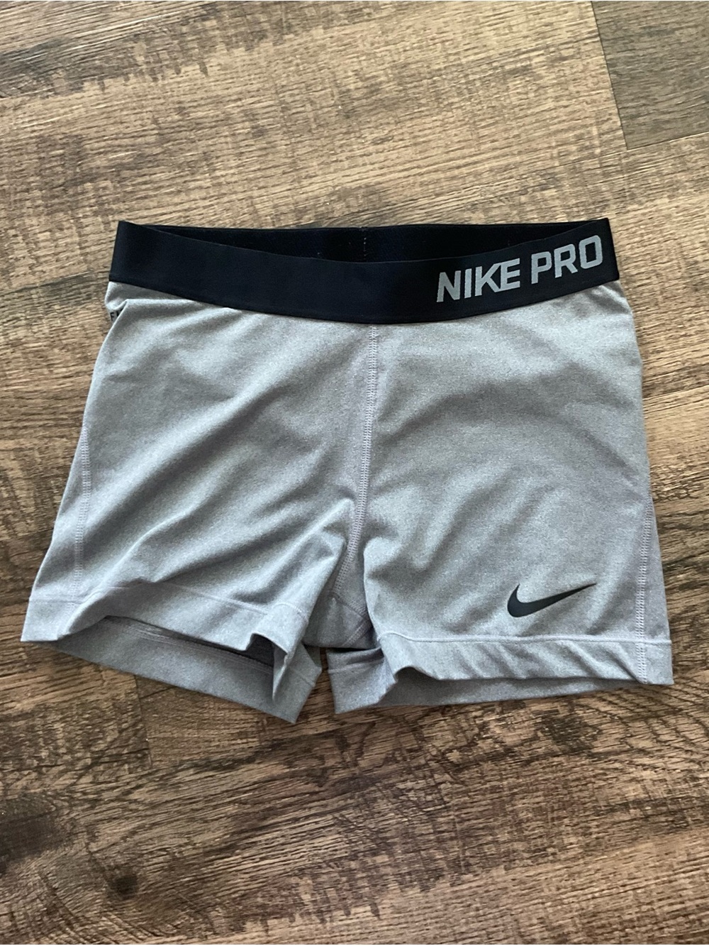 Nike Pro Women's Light Gray Athletic Shorts with Black Waistband